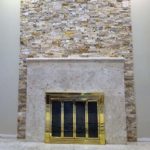 indoor fireplace with stone face