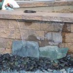 stone retaining water feature