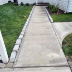 cement walkway from the driveway