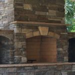 outdoor stone brick fireplace