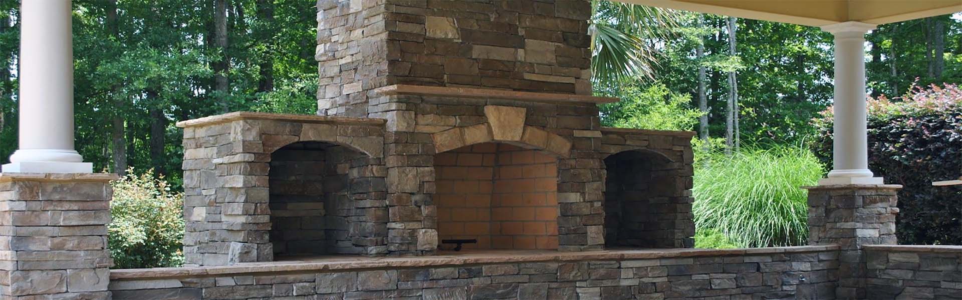 outdoor stone brick fireplace